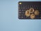 Bitcoin on keyboard light blue background