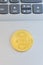 Bitcoin on a laptop. Bitcoin coin symbol on laptop, future concept financial currency, crypto currency sign. vertical photo