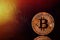 Bitcoin and the new concept of virtual money. Gold bitcomes with graphics and digital background. Gold coin with the letter of the