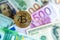 Bitcoin over dollar and euro bills investment, exchange rate, wealth, luxury, success, stock exchange - concept