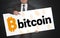 Bitcoin poster is held by businessman