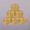 Bitcoin pyramid of golden metal coins