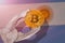 Bitcoin regulation in Uruguay; bitcoin btc coin being squeezed in vice on Uruguay flag background