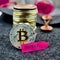 Bitcoin silver coin and pink invest arrow