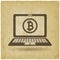 Bitcoin symbol on laptop screen vintage background