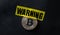 Bitcoin with warning tape