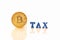 BitcoinBTC coin gold and wooden letters TAX on white background.