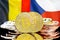 Bitcoins on Belgium and Czech Republic flag background