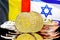 Bitcoins on Belgium and Israel flag background