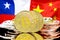 Bitcoins on Chile and China flag background