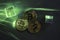 Bitcoins on concrete table with green laserbeam. Cryptovaluta concept