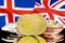 Bitcoins on Iceland and UK flag background