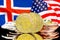 Bitcoins on Iceland and US flag background