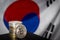 Bitcoins over flag of South Korea