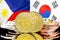 Bitcoins on Philippines and South Korea flag background