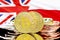 Bitcoins on Poland and United Kingdom flag background