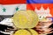 Bitcoins on Syria and Cambodia flag background