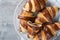 Bite croissants with chocolate on a white plate, french kitchen, breakfast