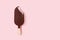 A bitten dark chocolate dipped ice lolly