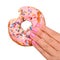 Bitten Donut with Sprinkles in Woman Hand isolated