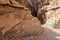 Bizarre natural patterns on the mountain walls on the tourist route of the gorge Wadi Al Ghuwayr or An Nakhil and the wadi Al