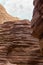 Bizarre patterns of high mountains along the Wadi Numeira hiking trail in Jordan