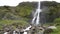 Bjarnarfoss waterfall and rocks in Iceland