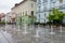 BKS Bank office in the Krekov trg town square in the middle of Celje city, Slovenia with fountain in rainy weather