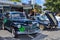 A black 1947 Mercury coupe at an outdoor car show