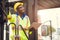 Black African American worker as staff foreman proud to happy smile working control loading cargo in shipping logistic warehouse