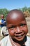 Black African Maasai tribe smiling child, close-up.