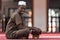 Black African Muslim Man Reading Holy Islamic Book Koran