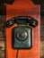 Black ancient analog phone.