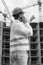 Black anf white rear view portrait of construction engineer talk