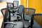 Black armchairs in meeting room