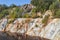 Black artificial lake and hills - mining and production of copper in Bor, Serbia