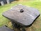 black ashtray table wooden background