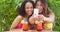 Black and Asian women taking selfie while on tropical vacation