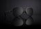 Black Aviator Sunglasses with Reflection on Black Background