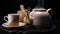 On a black background, a brewed teapot teapot on a tray is a lemon and a grassy saucer, from the kettle a lot of steam comes out