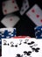 On black background and flying cards, poker chips and winning hand, street