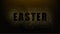 Black background with the words Easter.Gold glitter particles.Gold glitter texture.eps10