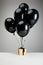 Of black balloons with gift box
