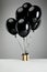 Of black balloons with gift box