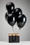 Of black balloons with paper shopping