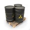 Black barrels with toxic materials on the pallet