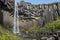 Black basalt columns and magnificent waterfall Svartifoss, Skaftafell National park, Iceland