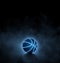 black basketball with bright blue glowing neon lines on black background with smoke