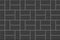 Black basketweave tile layout. Stone or ceramic brick wall mosaic background. Kitchen backsplash texture. Bathroom