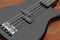 Black bass guitar detail